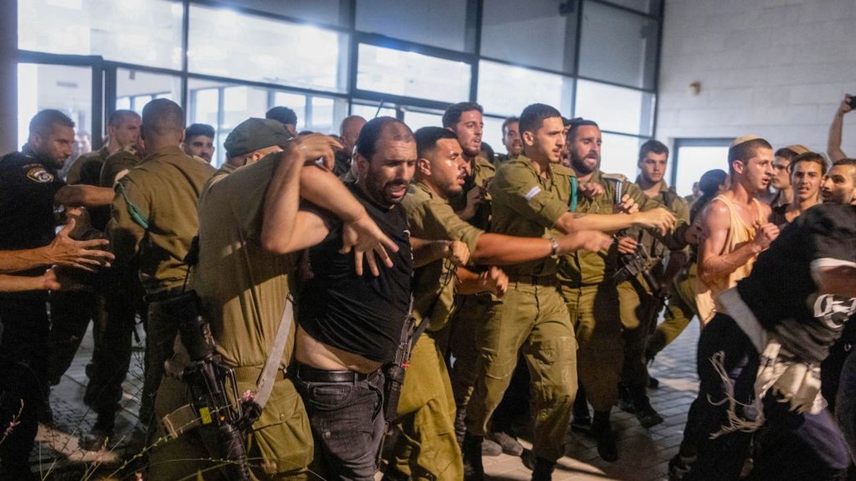 Far-right Israelis clash with Israeli soldiers and police at Beit Lid army base