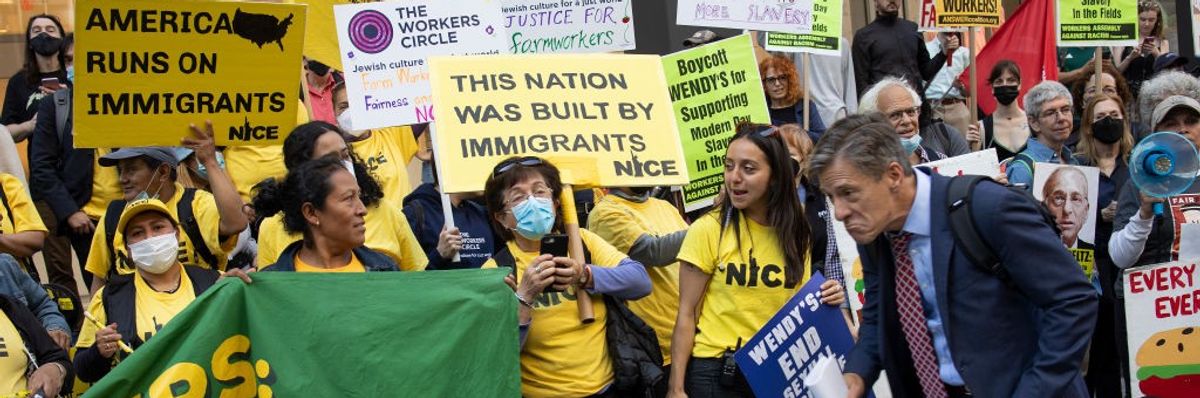 Farm workers demand a boycott of Wendys outside board members NYC office