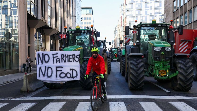 Farmers block the road with tractors