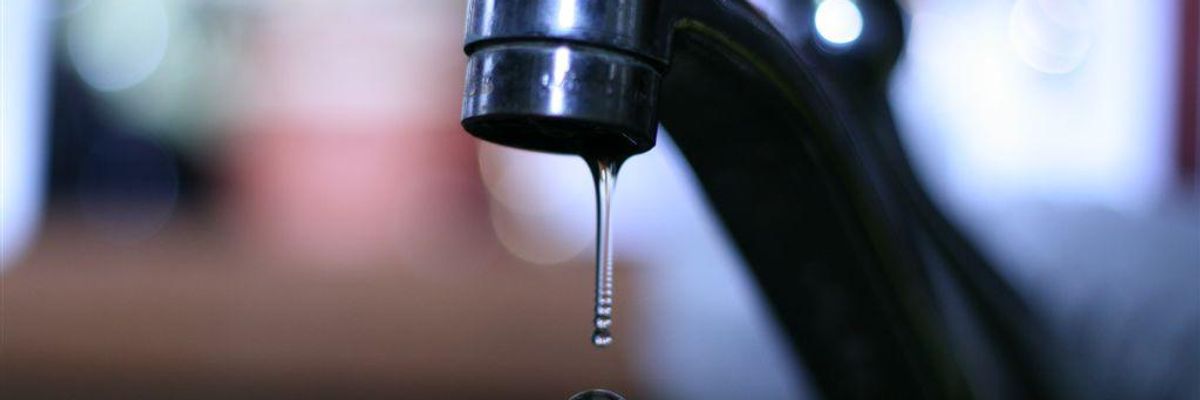 faucet with water drop