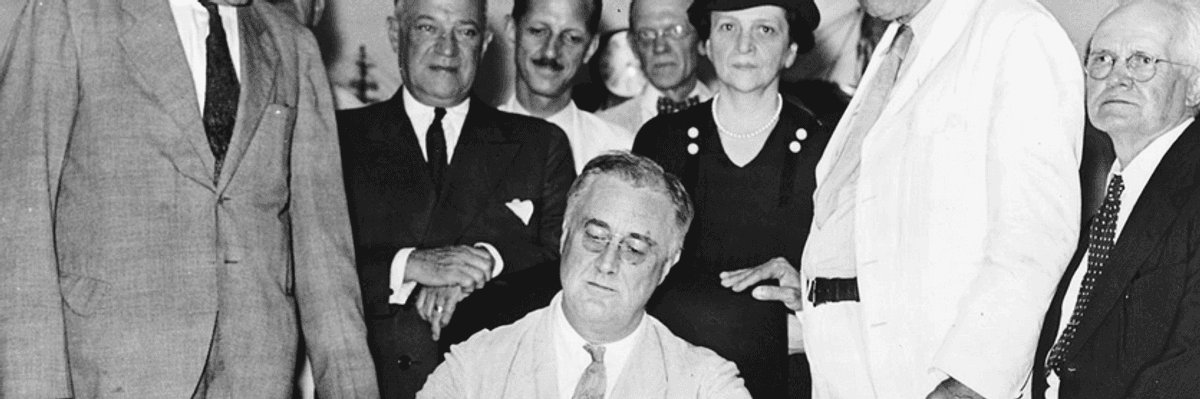 FDR signs Social Security legislation