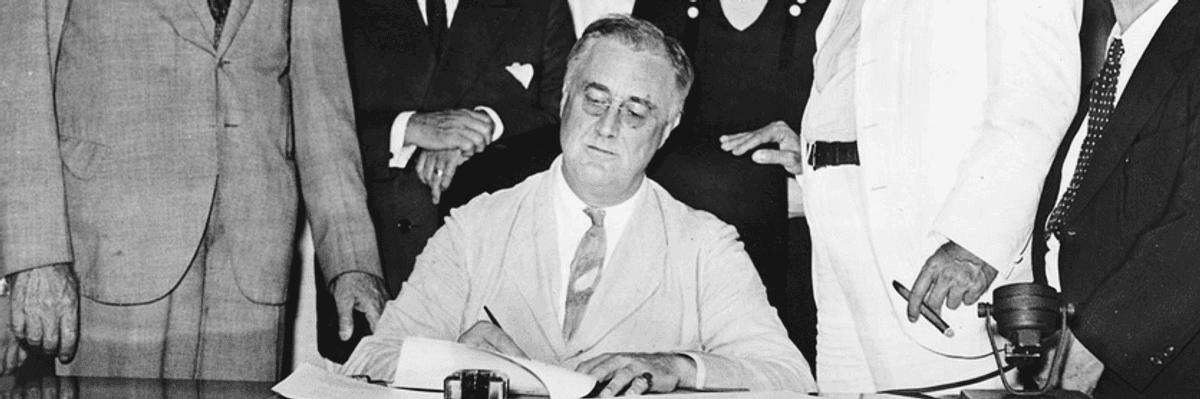 FDR signs Social Security legislation