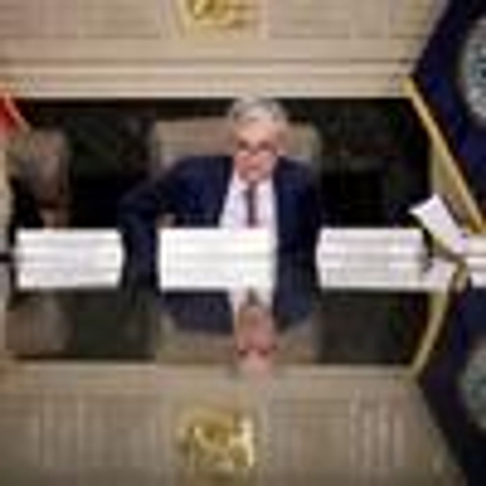 Fed Chair Jerome Powell attends a meeting