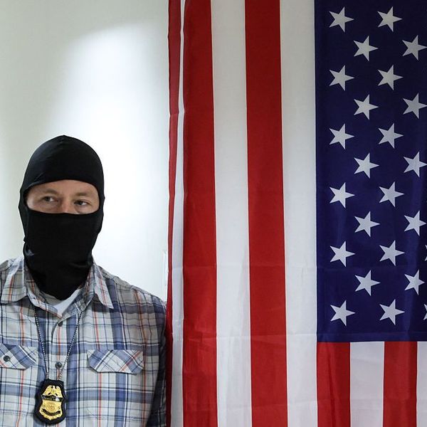federal agent and American Flag