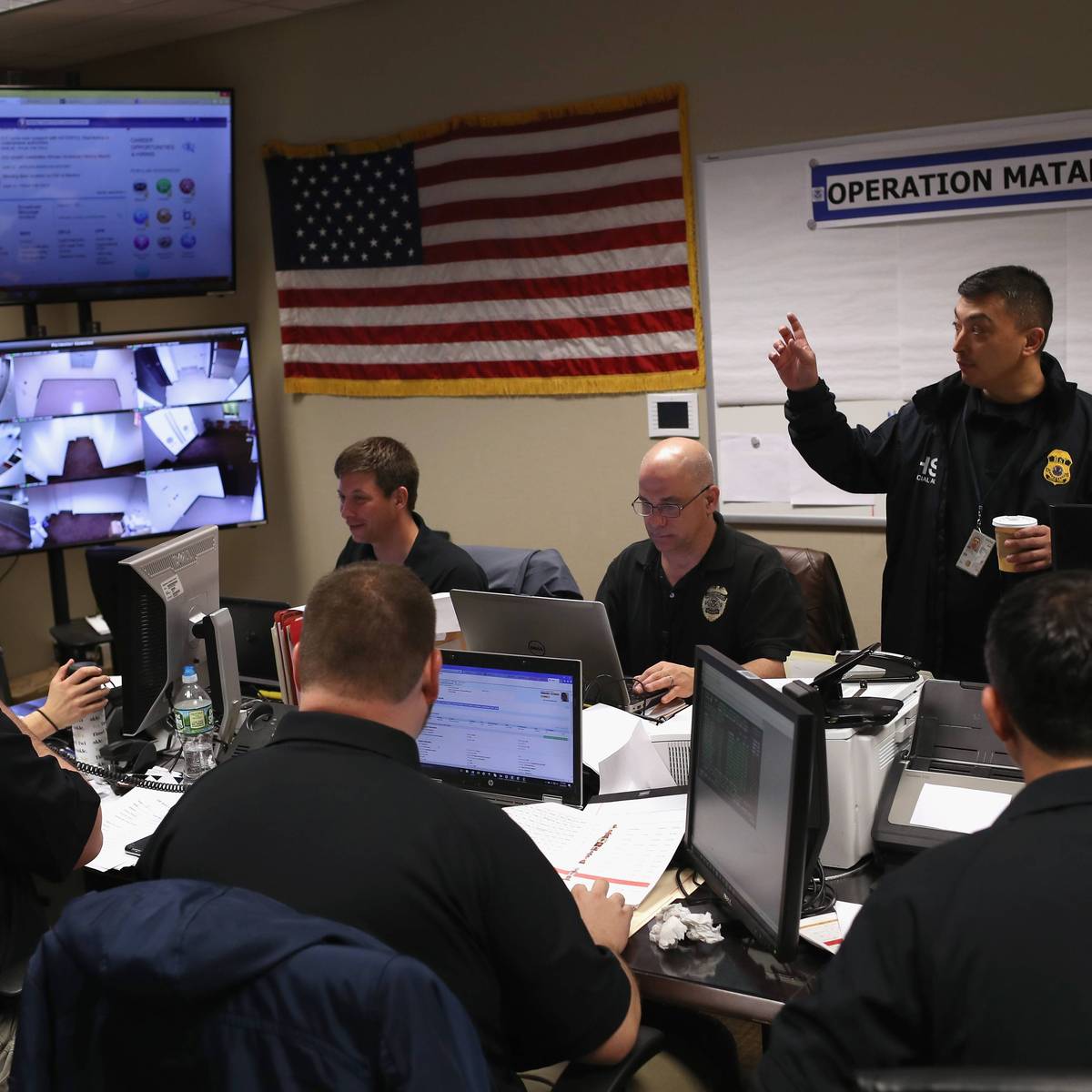 Federal immigration agents at a New York command center
