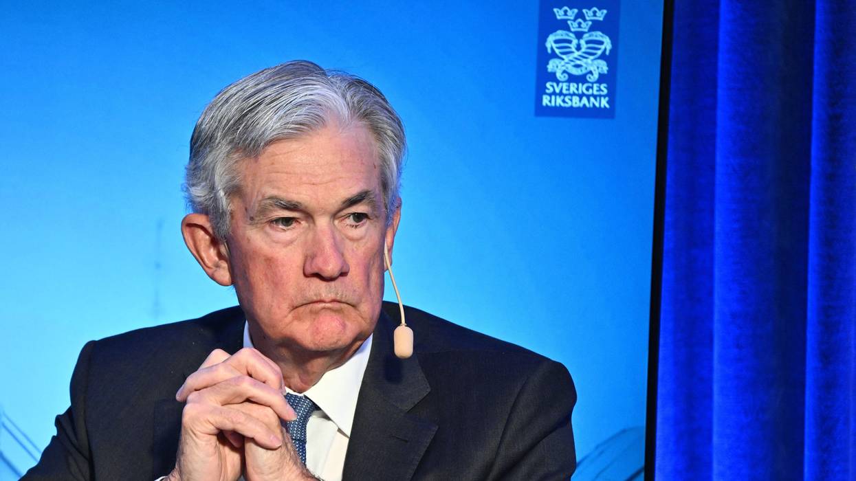 Federal Reserve Chair Jerome Powell attends a symposium