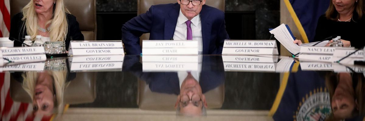 Federal Reserve Chair Jerome Powell (center) sits with Federal Reserve Govs. Lael Brainard (left) and Miki Bowman (right) at an October 4, 2019 event at the Fed's headquarters in Washington, D.C.