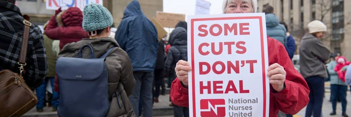 Federal workers protest outside HHS headquarters