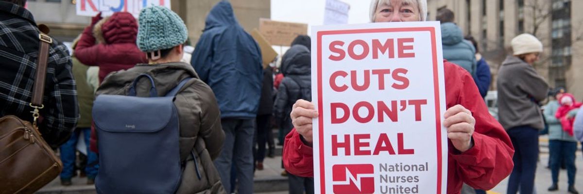 Federal workers protest outside HHS headquarters