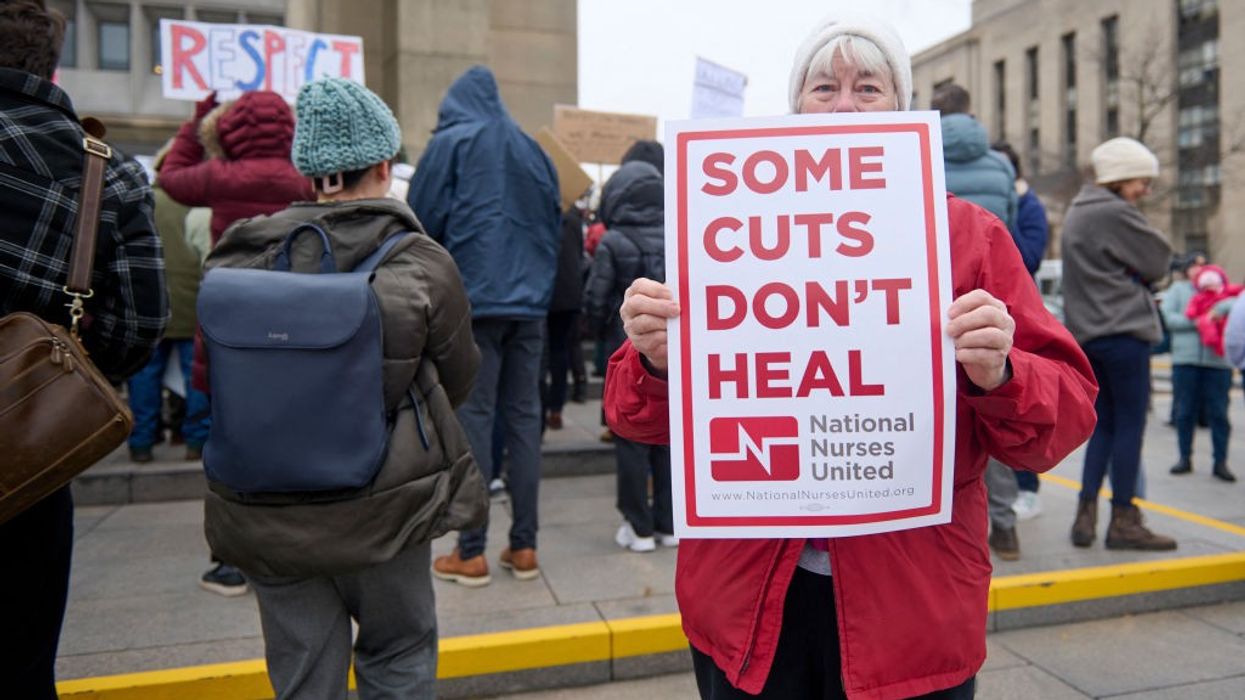 Federal workers protest outside HHS headquarters