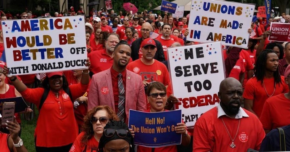 Federal workers rallied against President Donald Trump this summer over his anti-union executive orders. (Photo: AFGE/Flickr/cc)