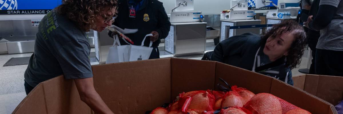 Federal workers receive food parcels at Newark Liberty International Airport in Newark