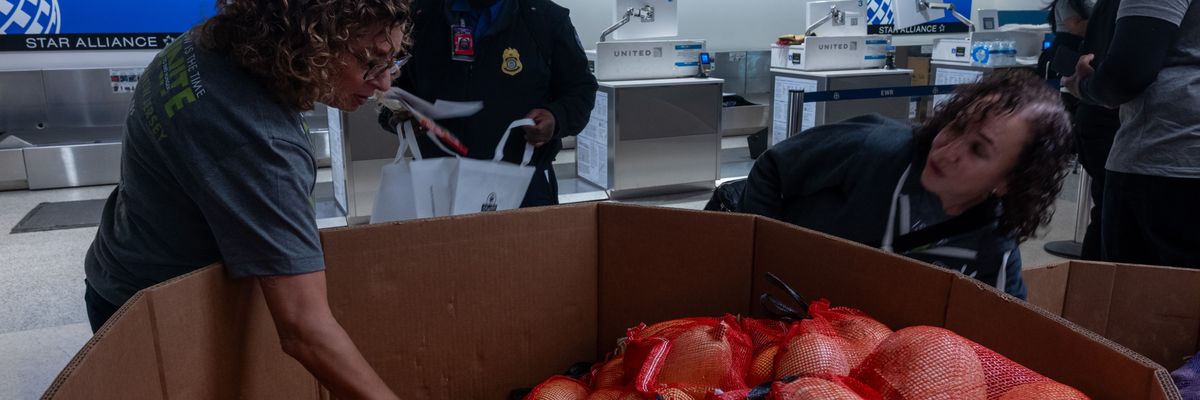 Federal workers receive food parcels at Newark Liberty International Airport in Newark