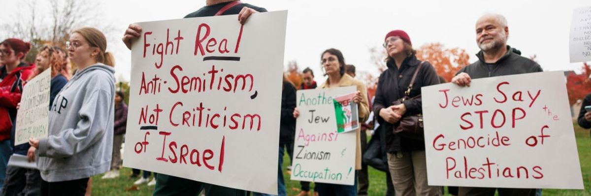"Fight real anti-semitism, not criticism of Israel," sign reads at protest Indiana University