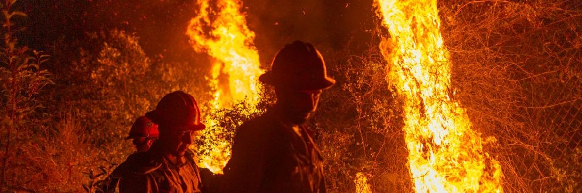 Fightfighters walking away from backfire they set