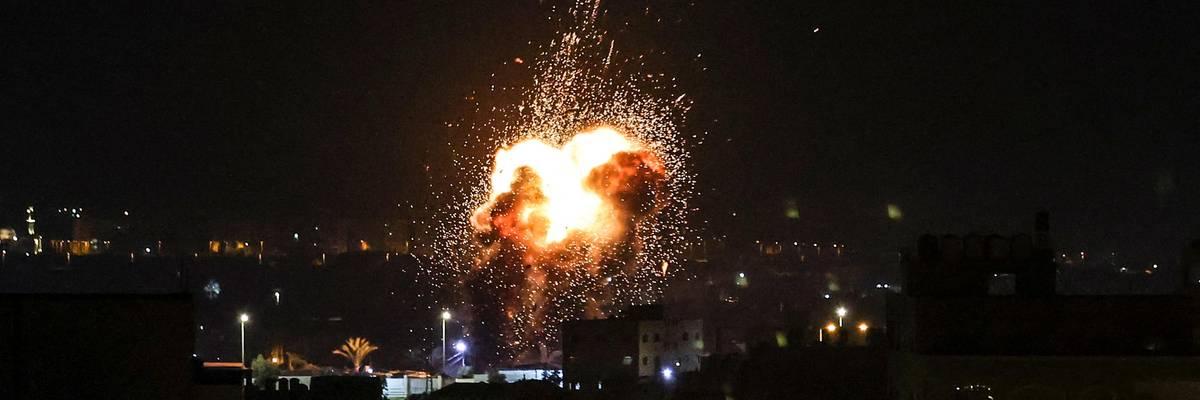 Fire and smoke rise above buildings in Gaza City after Israeli airstrikes