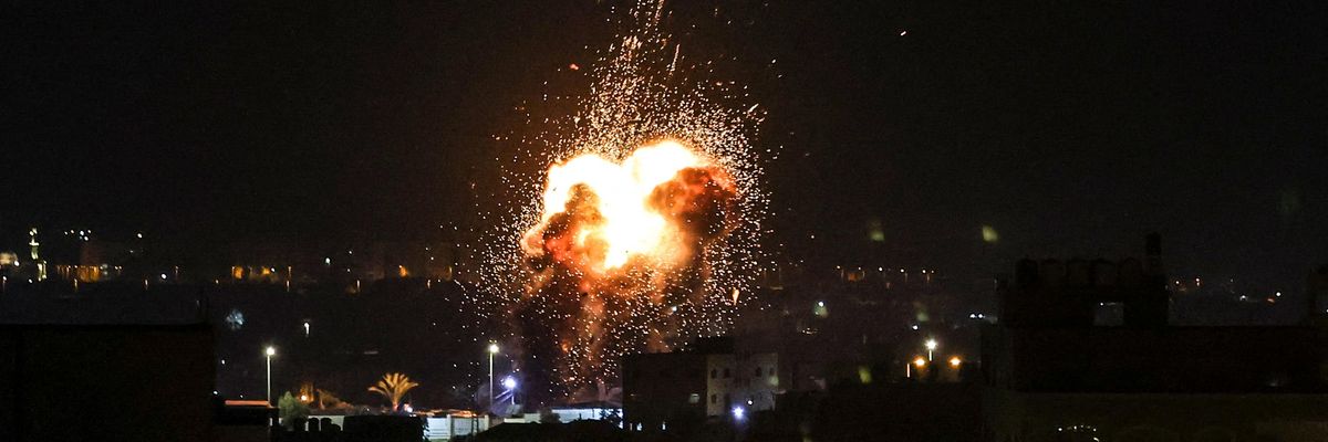 Fire and smoke rise above buildings in Gaza City after Israeli airstrikes