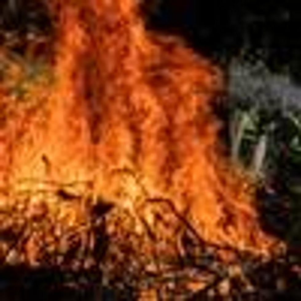 firefigher cools flames