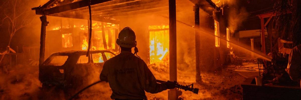 Firefighter fighting blaze in Los Angeles