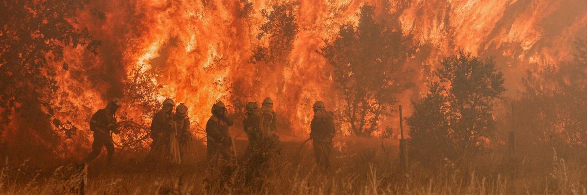 Firefighters battle fire in Spain