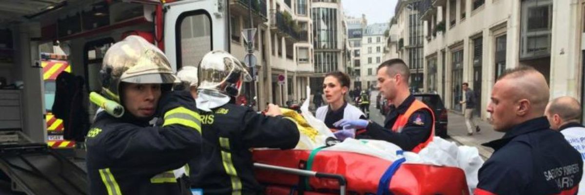 12 Dead, Others Wounded After Gunmen Attack Offices of French Satirical Magazine