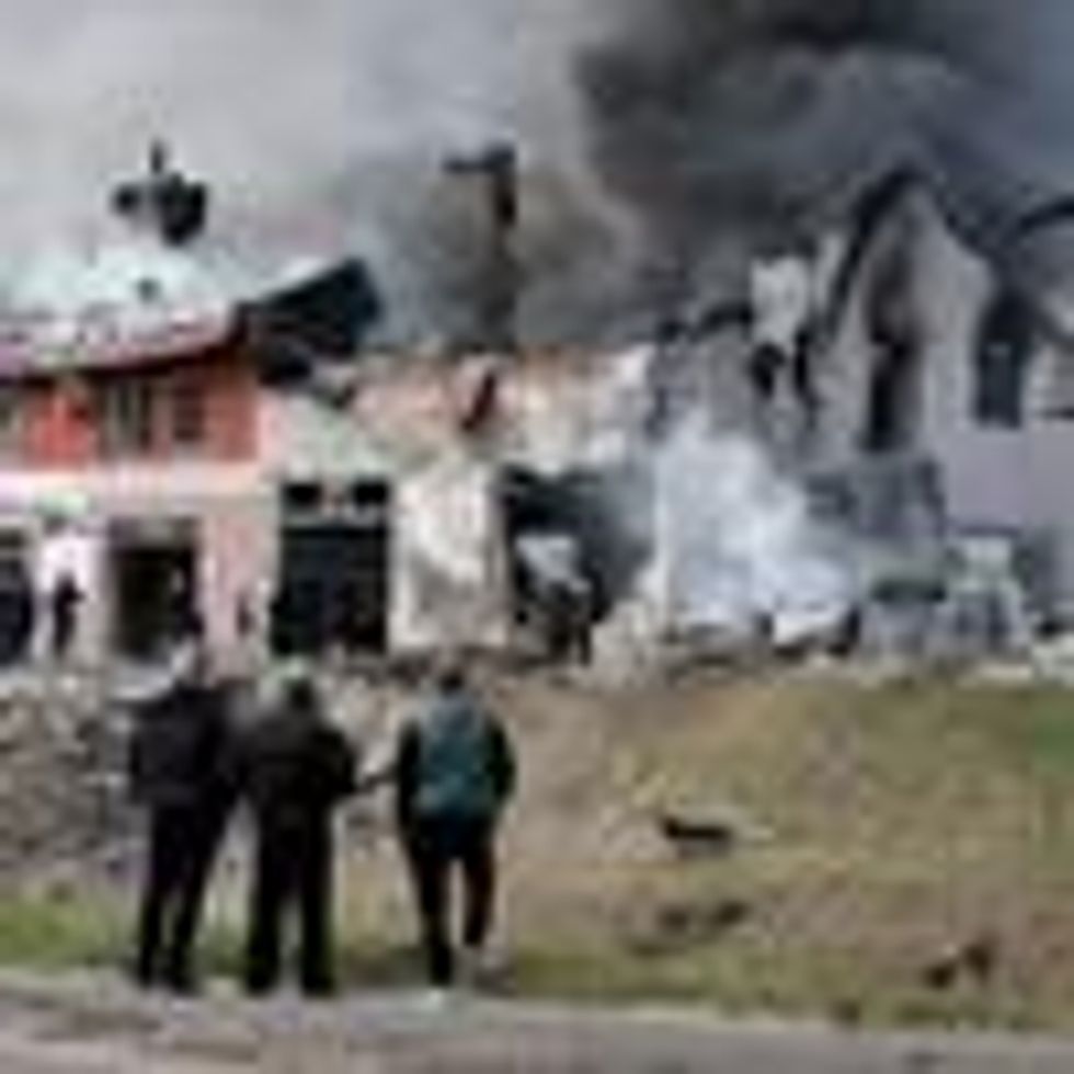 Firefighters combat a blaze in Lviv