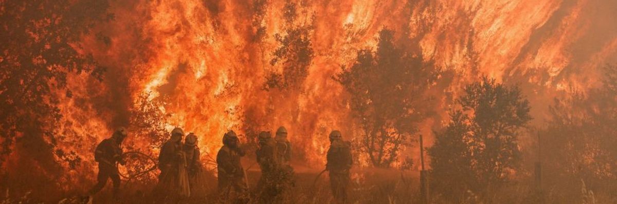Firefighters fight wildfire in Spain