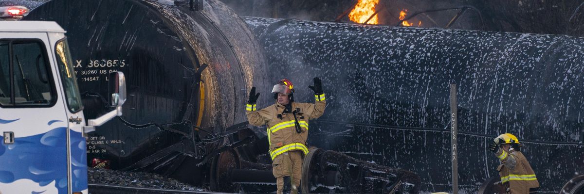 Firefighters respond after a train carrying crude oil derailed on December 22, 2020 in Custer, Washington.