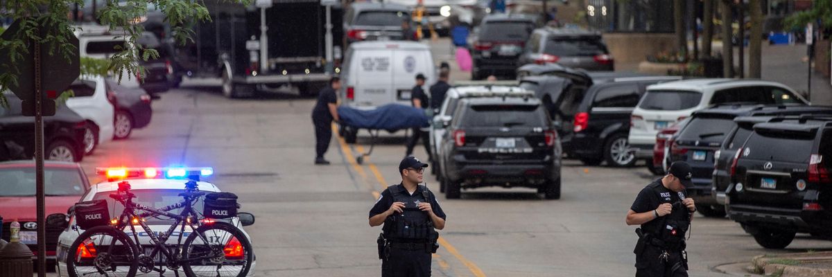 First responders take victims away from the scene of a mass shooting