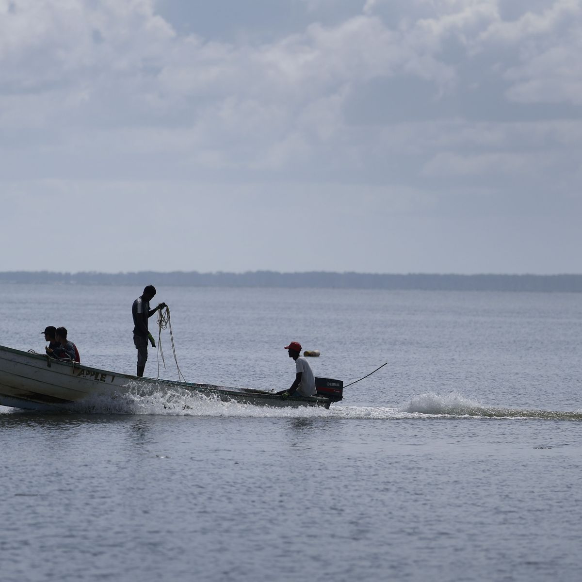 Fishermen work in the Gulf of Paria