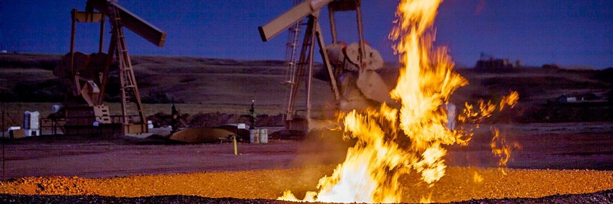 Flames from a flaring pit near a well