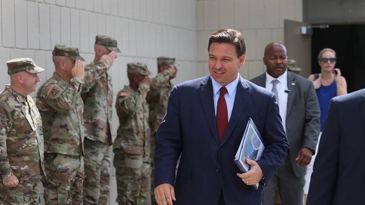 Florida Gov. Ron DeSantis arrives for a bill signing ceremony