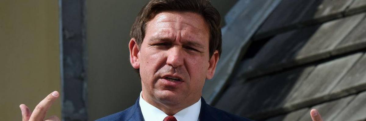 Florida Gov. Ron DeSantis speaks at a press conference to...