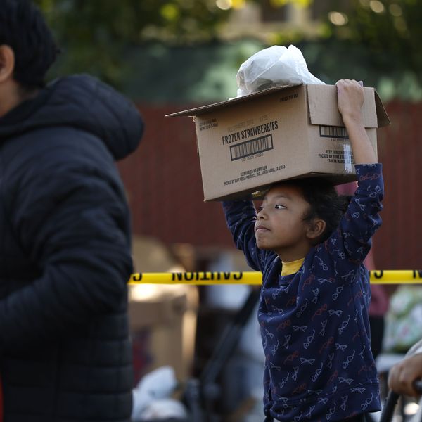 Food Bank Hands Out Meals Ahead Of Thanksgiving Holiday