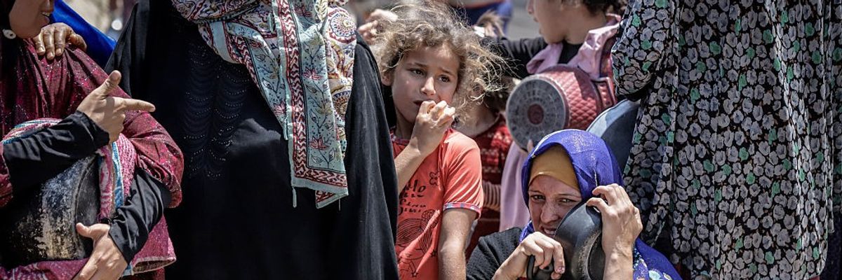 Food distributed to Palestinians in Gaza under Israeli attack and embargo