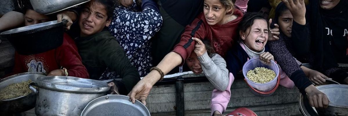 Food distribution to displaced Palestinians in Gaza