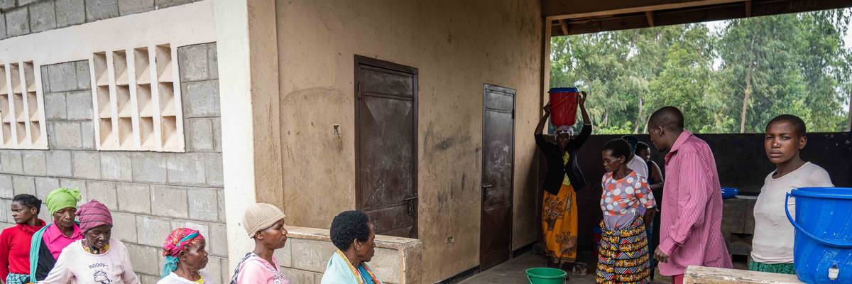 Food is distributed to people displaced by Cyclone Freddy in Malawi on March 29, 2023.