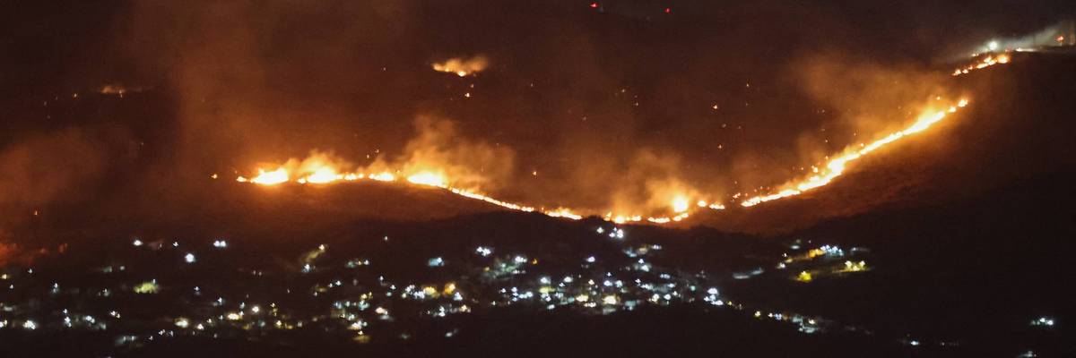 Forest fires sweep through the outskirts of the southern village of Kfar Shouba as a result of Israeli shelling that targeted the area