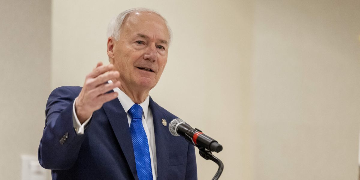 Former Arkansas Gov. Asa Hutchinson speaks before a meeting of the Republican Party of Orange County.