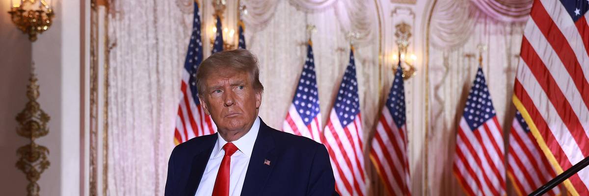 Former President Donald Trump leaves the stage after announcing his 2024 run