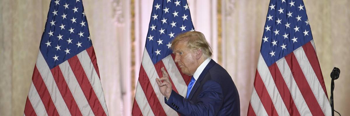 Former President Donald Trump waves to guests during an election night party at Mar-a-Lago on November 8, 2022 in Palm Beach, Florida.