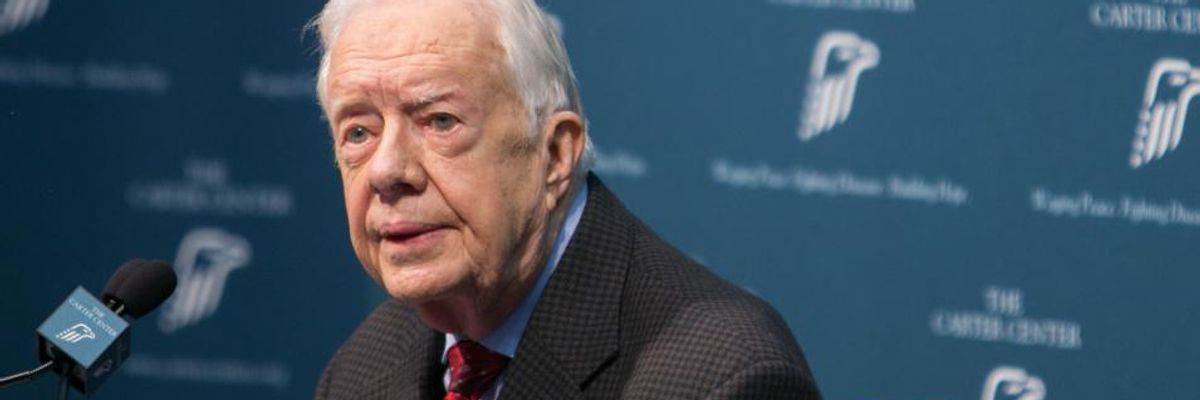 Former President Jimmy Carter speaks during a press conference