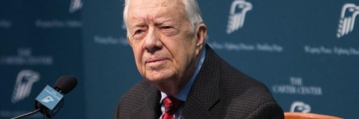 Former President Jimmy Carter speaks during a press conference