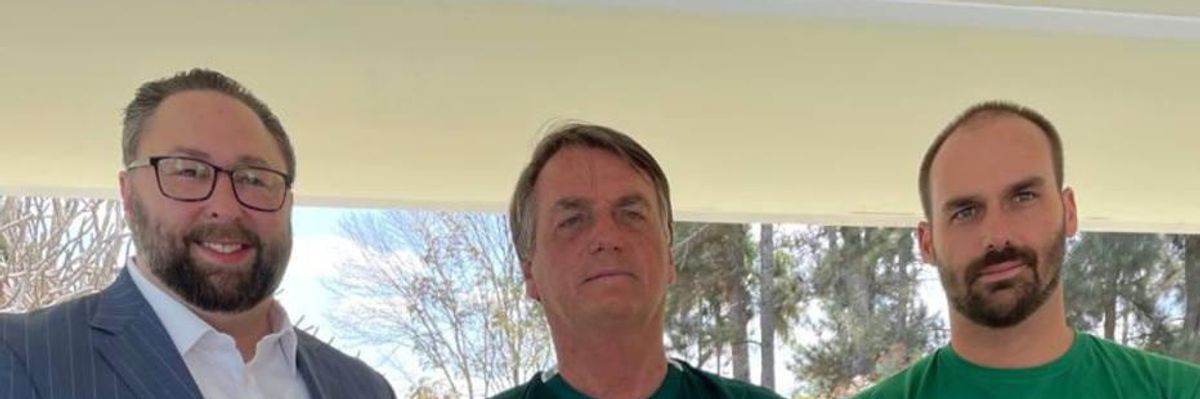 Former Trump adviser Jason Miller (l), stands with Brazilian President Jair Bolsonaro (c) and his son Eduardo just two days before coordinated far-right demonstrations took place on September 7, 2021. (Photo: Screenshot/via @BrianMteleSur)