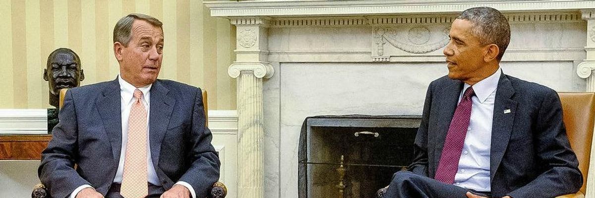 Former U.S. President Barack Obama, right, talks with then-House Speaker John Boehner in the White House.