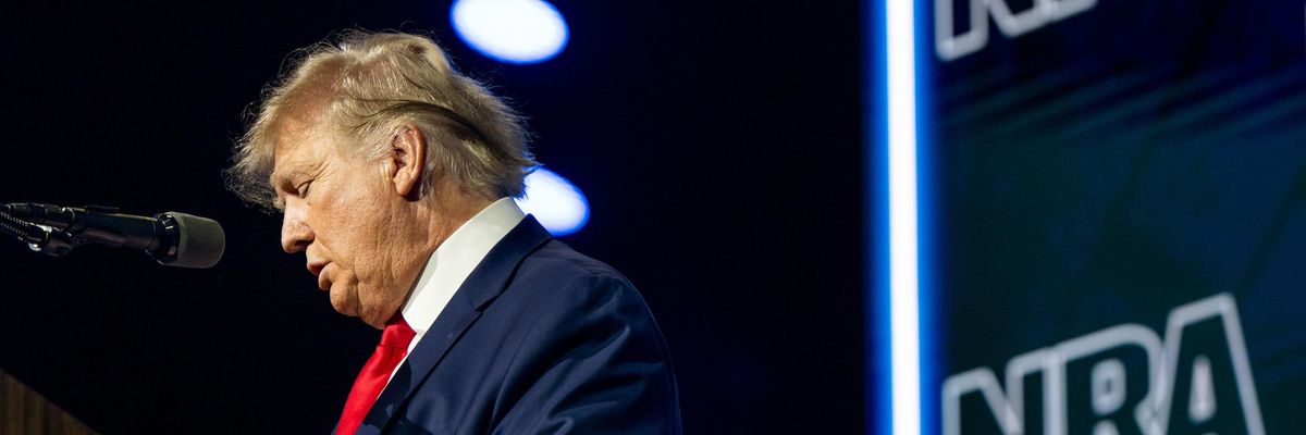 Former U.S. President Donald Trump reads the names of the victims of the Uvalde, Texas mass shooting during the National Rifle Association (NRA) annual convention on May 27, 2022 in Houston. (Photo: Brandon Bell/Getty Images)