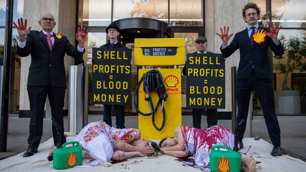 Fossil Free activists seen demonstrationing outside Shell
