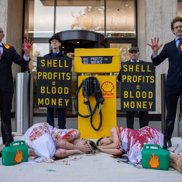 Fossil Free activists seen demonstrationing outside Shell