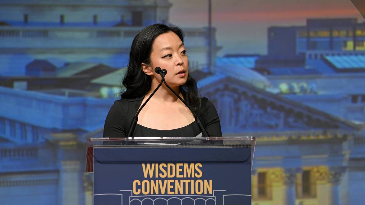 Francesca Hong speaks into a microphone.
