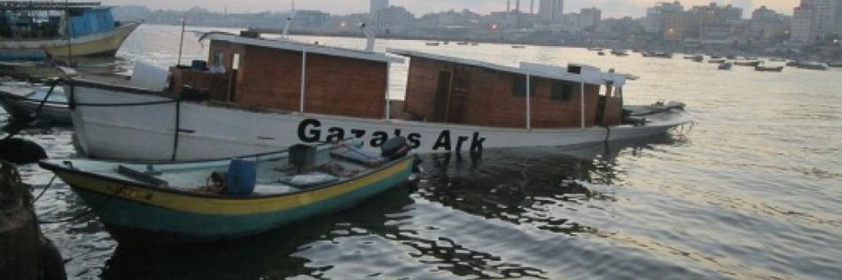 Freedom flotilla Gaza's Ark shown partially submerged in Gaza Port following an April attack